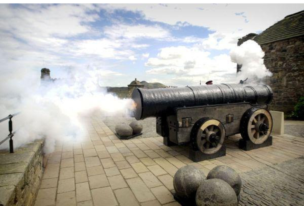 a train on a track with smoke coming out of it